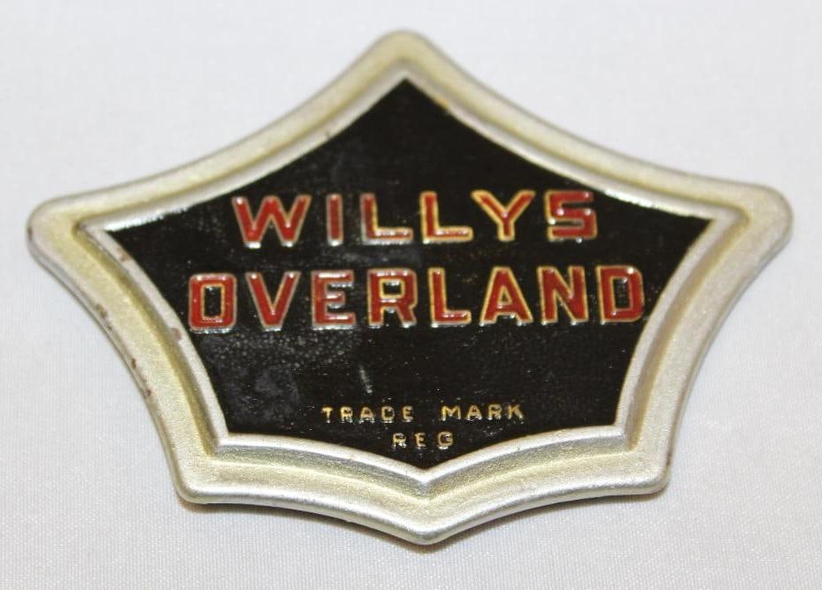1932-1933 Willys Overland Emblem Badge: 3.5" x 2.75", this badge was used on the headlight bar