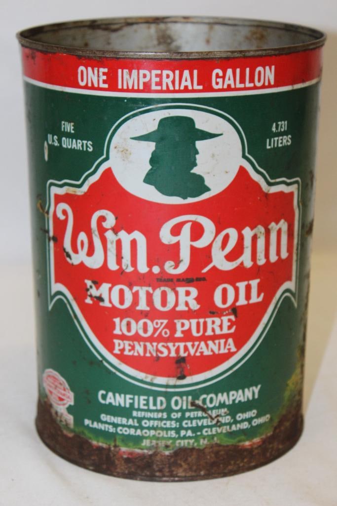 Canfield Wm. Penn Metal 5 Quart Motor Oil Can: missing top lid, has heavy rust staining along the bottom edge as well as wear and discoloration throughout, 9.5" x 6.5"