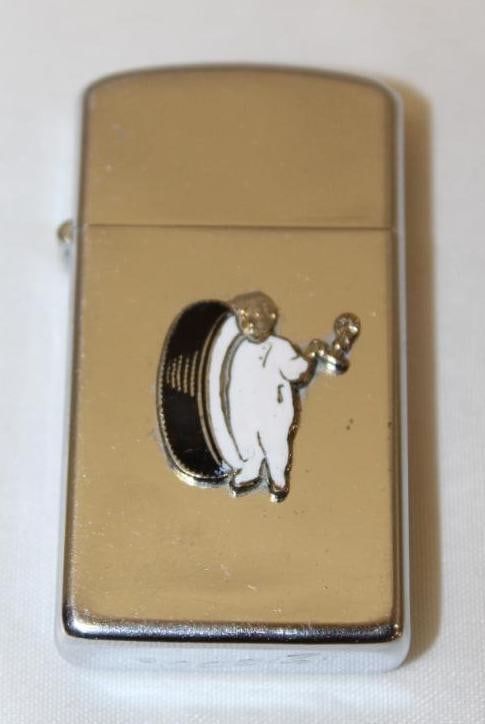 Fisk Tire Co Advertising Zippo Lighter: 2.25" x 1.25" x .5"
