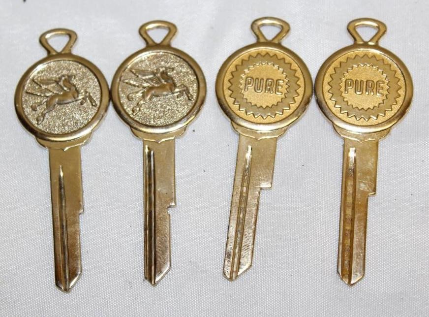 Group of 4 Pure and Mobil Service Station Advertising Key Blanks (1 of 2)