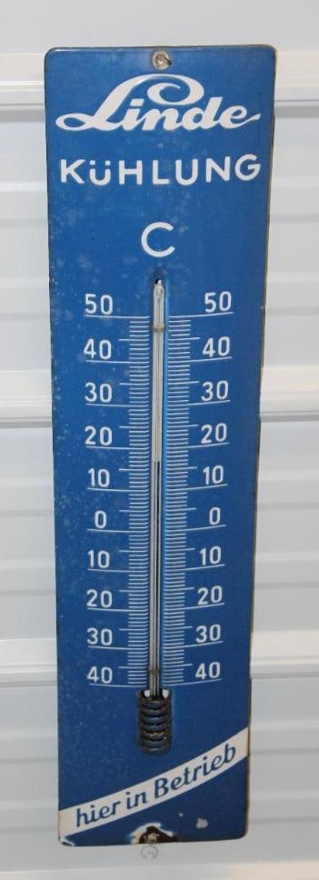 Linde Kuhlung Porcelain Advertising Thermometer: 27" x 6" x 6", it is working, in good condition with only a chip near the bottom edge and mounting hole