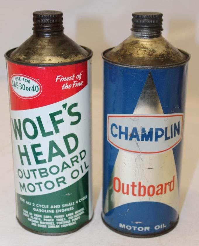 Group of 2 Wolfshead and Champlin Round Metal Conetop Outboard Cans: 8.5" x 3.25", both have scratches and wear, Champlin has a dent on the logo, both are empty with lid