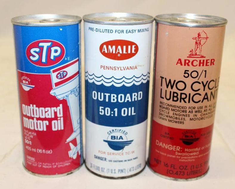 Group of 3 16oz Outboard Advertising Cans Archer, STP, Amalie: largest 6" x 2.5", Archer has a couple scratches and is full, STP is drained by 2 holes in the bottom and has minor scratches, Amalie is drained by 2 holes in the bottom and has scratches and