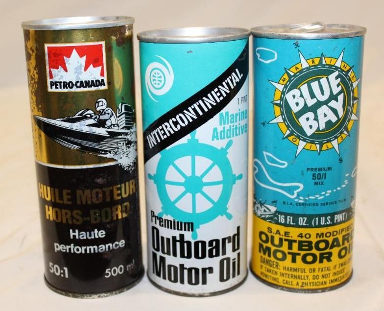 Group of 3 Outboard Advertising Cans Bluebay, Intercontinental, Petro-Canada: largest 6.5" x 2.5", all are full, Petro-Canada has discoloration and rust staining throughout, others are in good condition with only light scratches