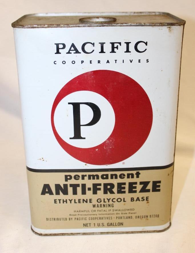 Pacific Co-Op One Gallon Anti-Freeze Can: It has some scratches and rust staining along with some spray paint on the back. It was emptied from two holes in the top lid