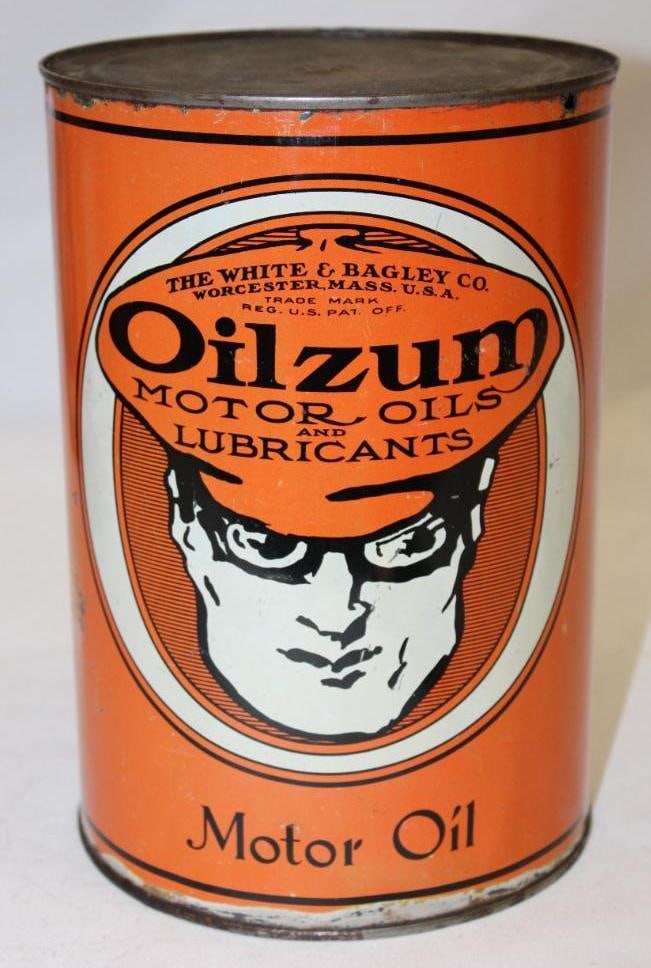 Oilzum "Motor Oil" Metal 5 Quart Motor Oil Can: drained by two holes in the bottom lid, in good condition with light wear and scratches throughout, 9.5" x 6.5"