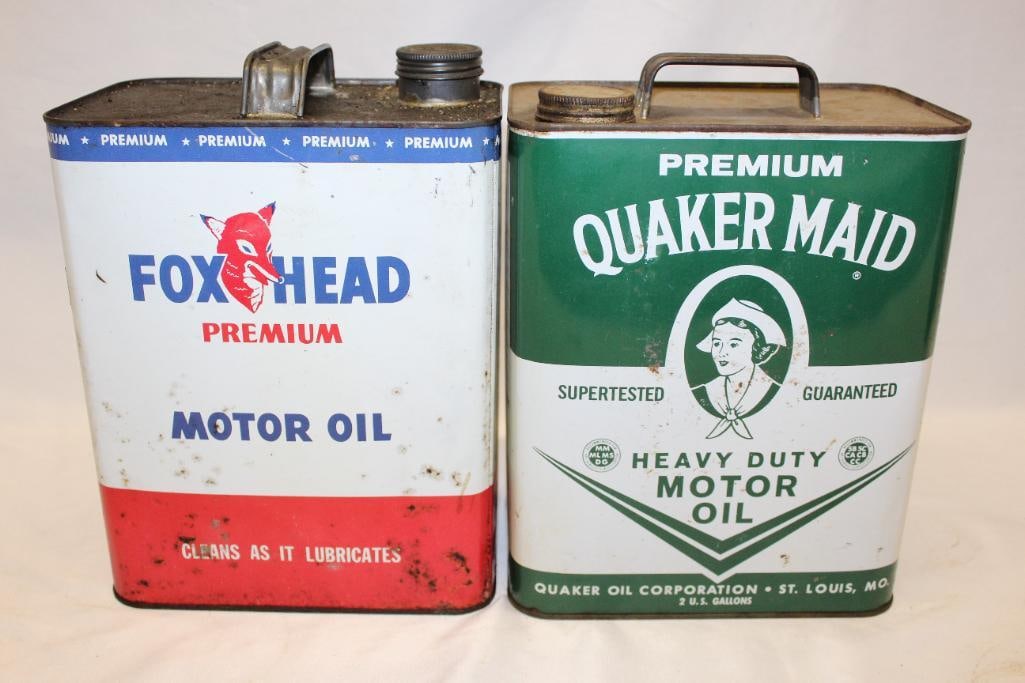 Group of Two Quaker Made and Fox Head 2 Gallon Motor Oil Cans: Both have some rust staining, scratches, and wear.