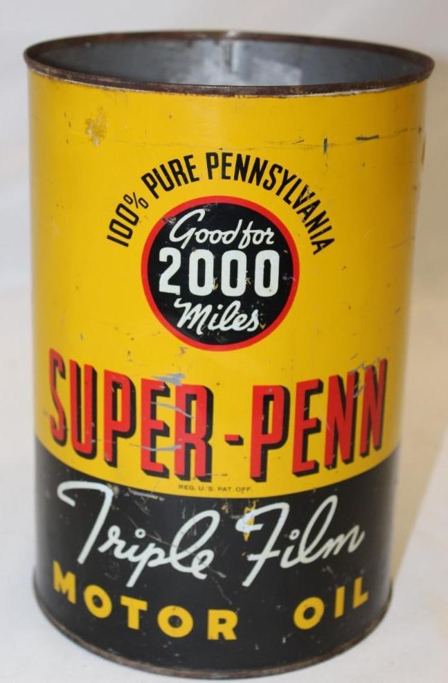 Super Penn Metal 5 Quart Motor Oil Can: has good color with some scratches throughout, 9.5" x 6.5"