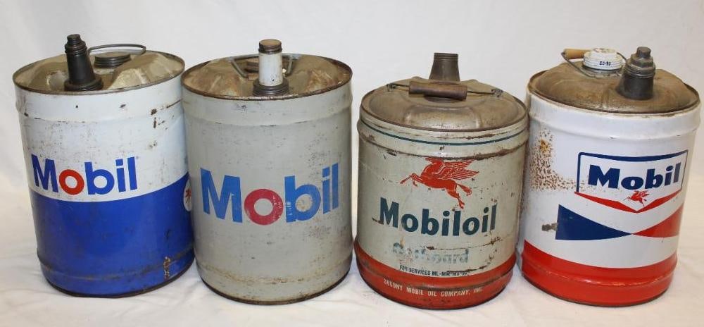 Group of Four Socony Mobil 5 Gallon Round Oil Cans: One is marked Outboard and it is missing both caps