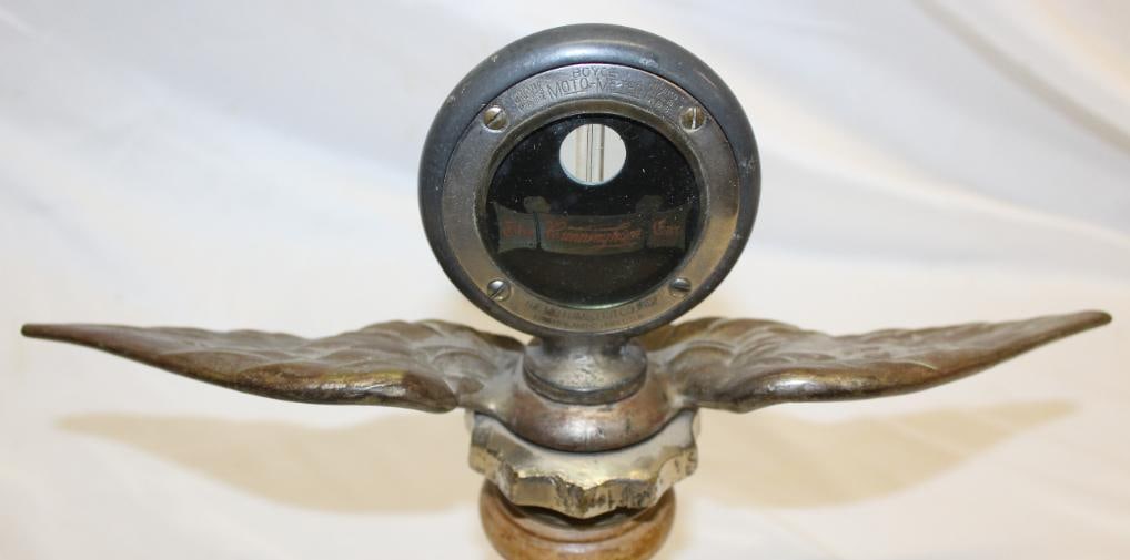 The Cunningham Car Moto Meter Radiator Mascot: 13" x 5" x 2.5", mounted to winged base