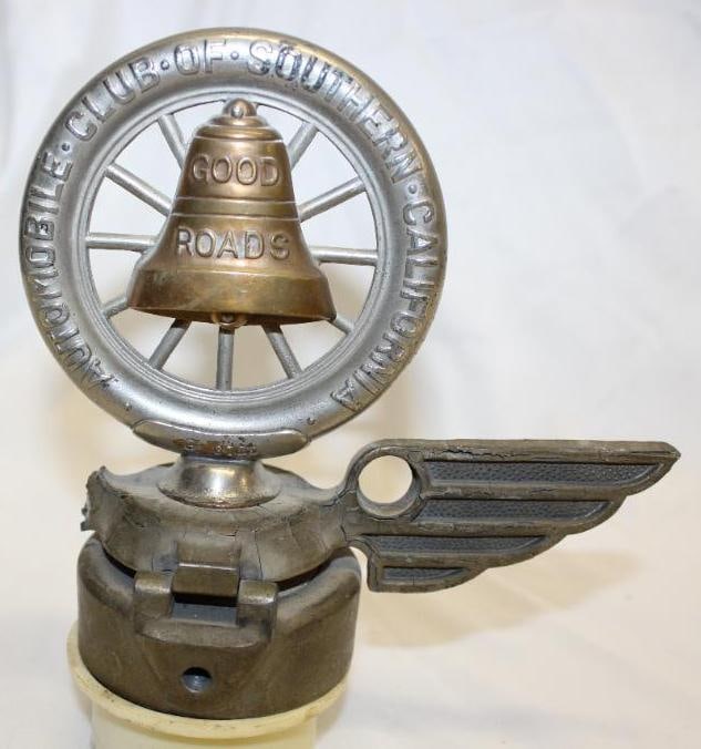 California Automobile Club Good Roads Radiator Mascot: 6" x 5.5" x 3", mounted to winged base, one wing is broken, the base has some age cracks