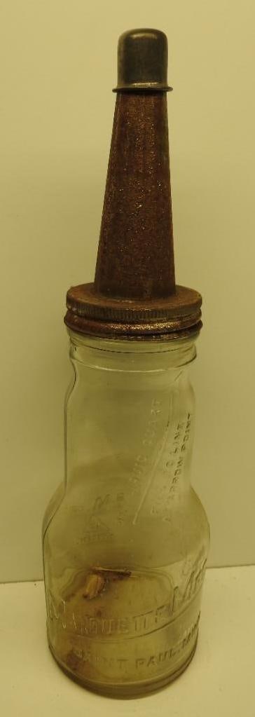 Marquette Quart Oil Bottle: Embossed glass quart bottle with metal spout