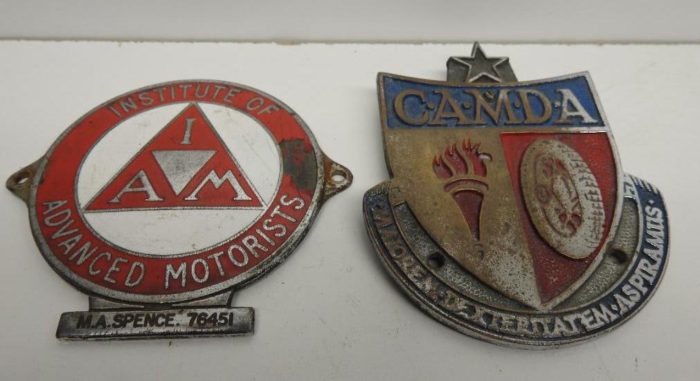 Camda and IAM License Plate Emblem Toppers: Each shows some wear, size of largest 4"x3.25"