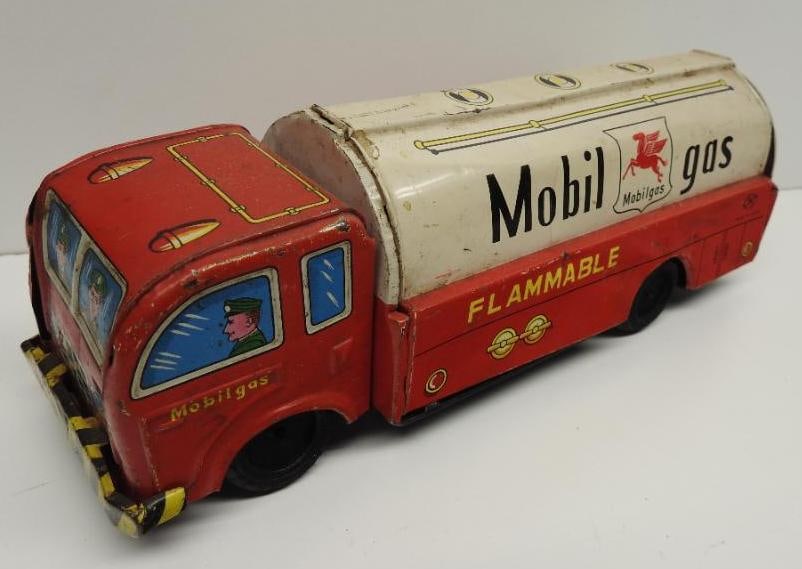 Mobil Gas Toy Tanker Truck: Metal friction toy, shows wear from use and age, size is 3"x9"x3"
