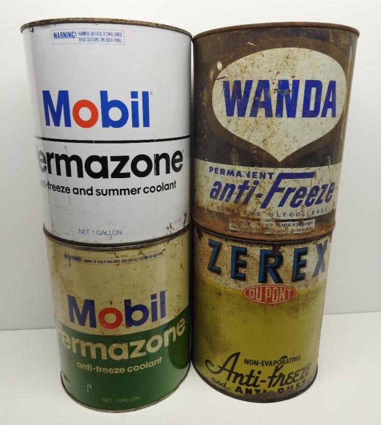 Group of Gallon Anti-Freeze Cans: Incldues Mobil, Wanda, and DuPont, all are empty metal gallon cans in fair condition, Wanda missing top