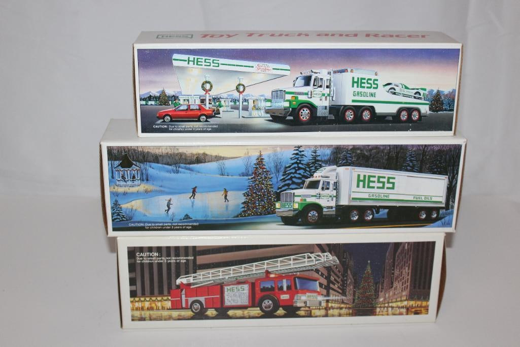 Group of 3 Hess Gas Station Trucks w/ Boxes: largest 15" x 3.5" x 4", firetruck, 18 wheeler, truck w/ racer