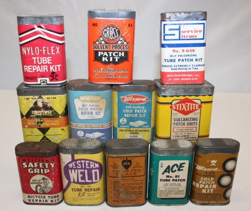 Group of 12 Tire Repair Advertising Cans: Largest is 2.75" x 3" x 1.75"
