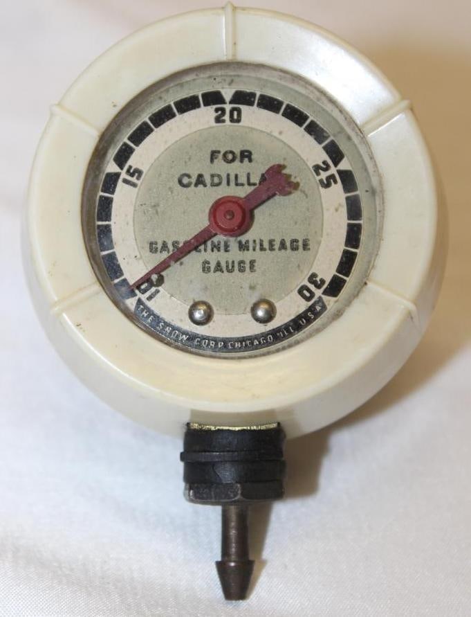 1940's Cadillac Gasoline Mileage Guage by Snow Corp: 2.75" x 2.5"; Copyright 1946