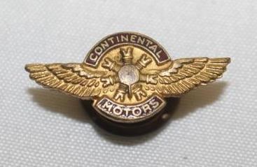 Continental Motors Winged Wheel Pin Badge: 1" x .5"