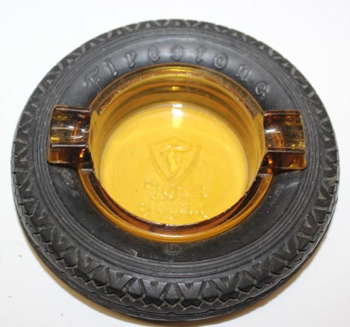 Firestone Mark of Quality Advertising Tire Ashtray: 5.5" Diameter; Embossed Amber Glass; Large Motto