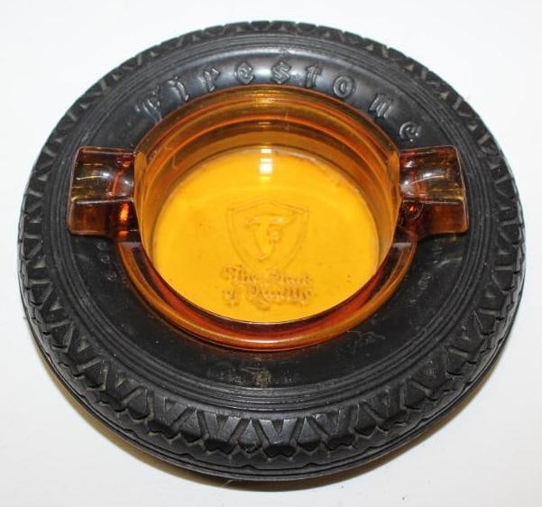 Firestone Mark of Quality Advertising Tire Ashtray: 5.5" Diameter; Embossed Amber Glass; Small Motto
