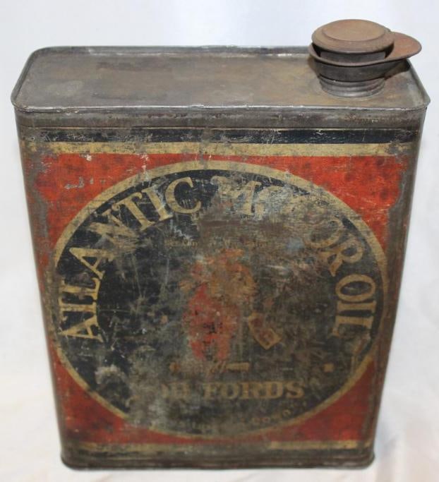 Atlantic Motor Oil for Fords One Gallon Oil Can with Parrot Graphics: It has heavy wear and scratches throughout