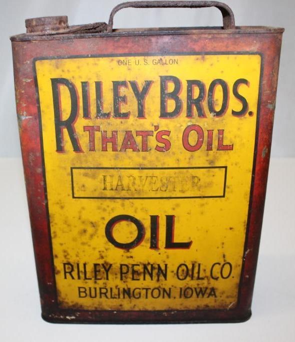 Riley Brothers One Gallon Motor Oil Can: The front has staining and discoloration and the reverse has heavy rust staining