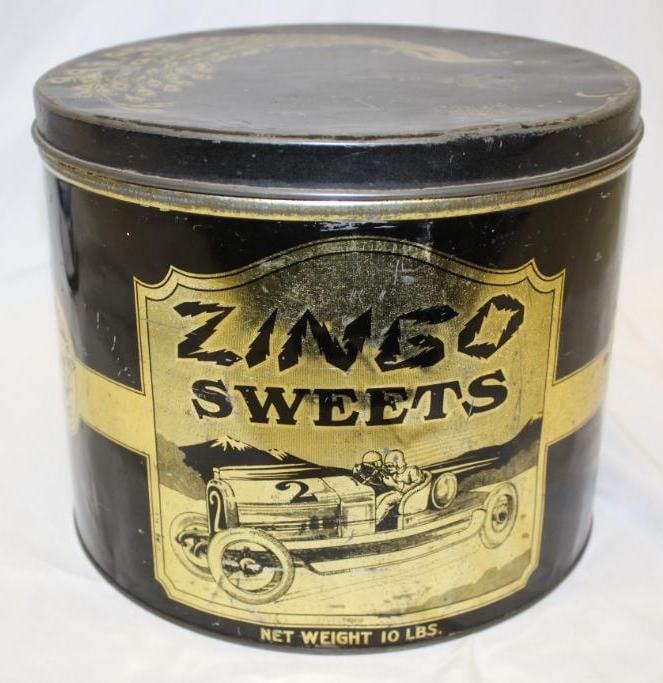 Large Zingo Sweets Euclid Candy Co 10 Lb Can with Automobile Graphics: It is in good condition with light wear throughout.