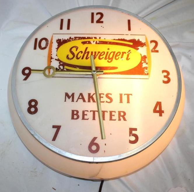 Schweigert Makes it Better Sausage and Bacon Advertising Clock: it has some paint flaking and several small cracks, lights up but does not run, 17" diameter