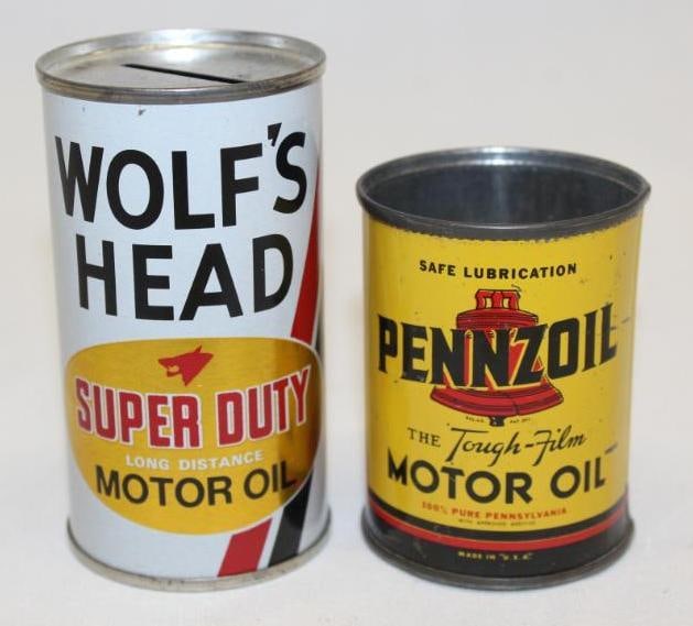 Group of 2 Pennzoil and Wolf's Head Advertising Oil Can Coin Banks: Both have some light wear. The Pennzoil is missing the top lid.