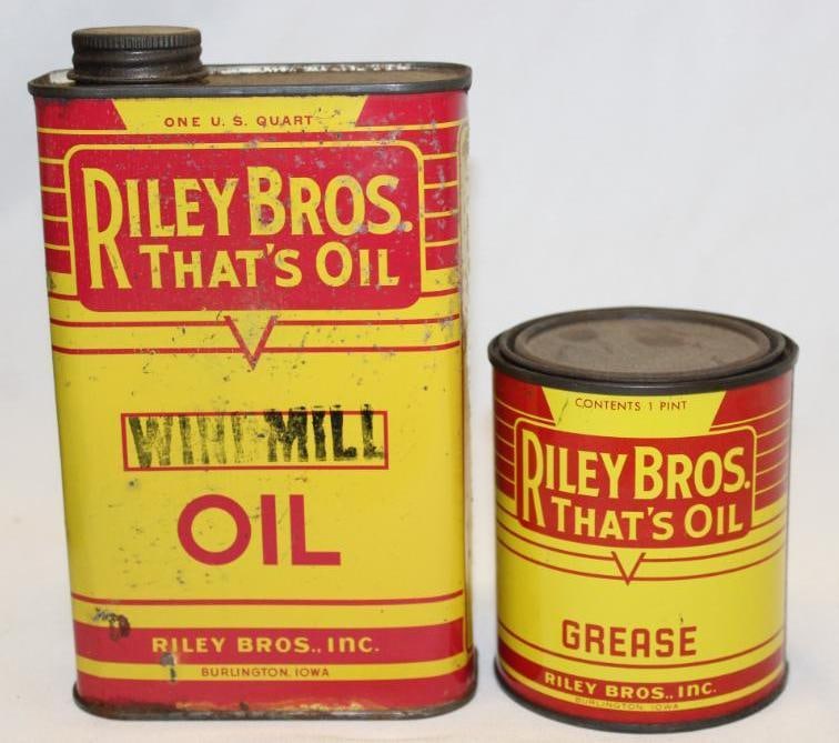 Group of 2 Riley Brothers Grease and Windmill Oil Cans: The grease can has some fading and scratches. The windmill oil has rust staining and scratches.