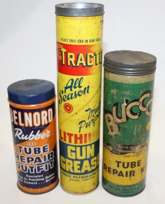 Group of 3 Tracto Grease Belnord and Bucco Tire Repair Kits: Each have some scratches and wear. The Belnord is metal and the other two are cardboard
