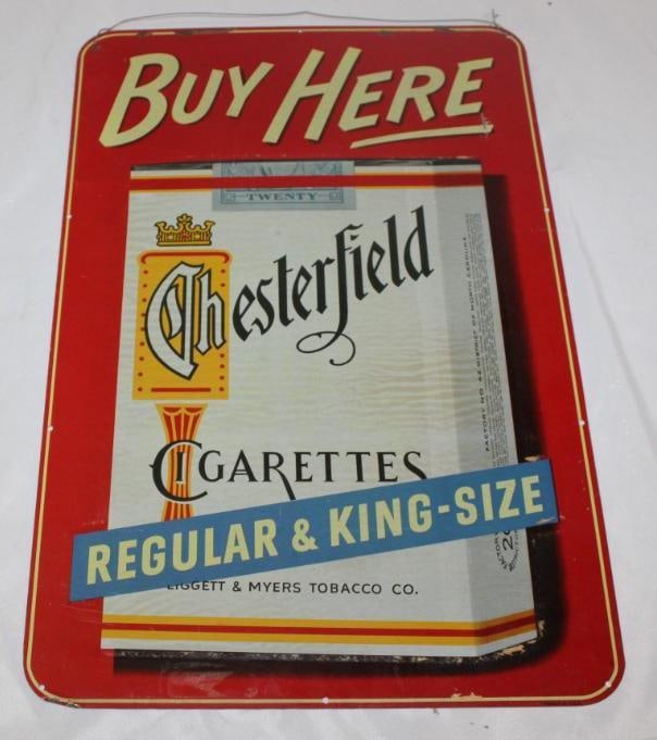 "Buy Here" Chesterfield Cigarettes Metal Advertising Sign: 17.75" x 11.75", has very good color and shine, does have some hazing marks around the edge, as well as some slight remnants of the original paper