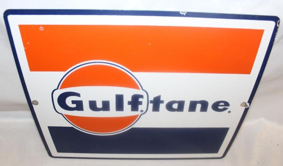 Gulf GulftanePorcelain Gas Pump Plate Sign: 11.25" x 8.5". In good condition with good color and good gloss. It has some slight edge and mounting hole wear.