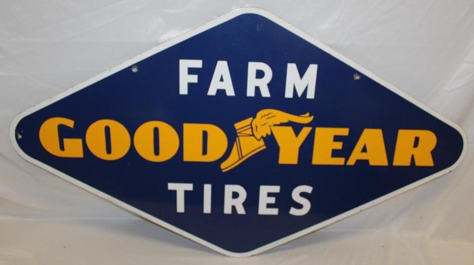 Excellent Goodyear Farm Tires Porcelain Advertising Sign: 54" x 30.5". It is marked Property of Goodyear SW-51. The display side is in excellent condition with only some slight edge wear and a chip at the mounting hole (9+ Condition). The reverse