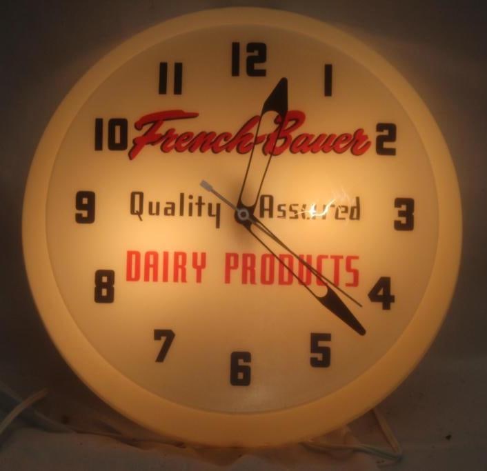 French-Bauer Dairy Milk & Ice Cream Advertising Light-Up Clock: There is a crack in the face and some heat damaged. It runs and lights. 15.5" diameter.