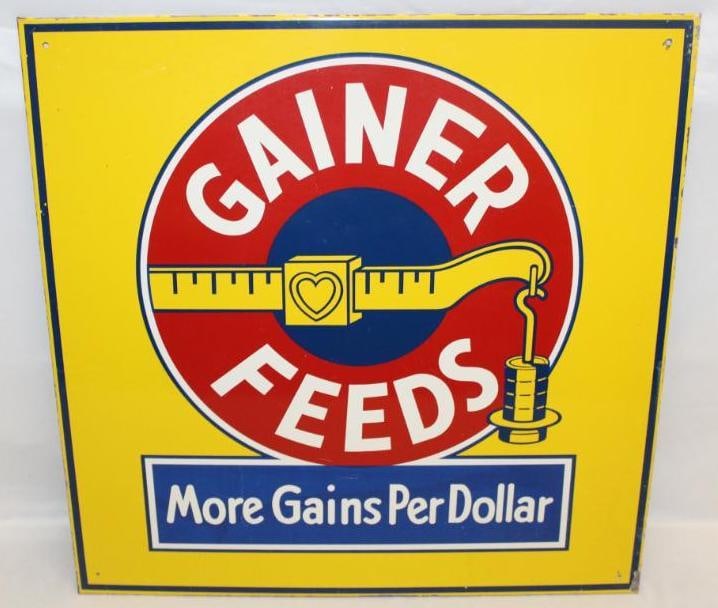Gainer Feeds Metal Advertising Farm Sign: 20" x 20". It is metal with a rolled edge. It is in good condition with only some light wear to the field and some more wear along the outer edge.