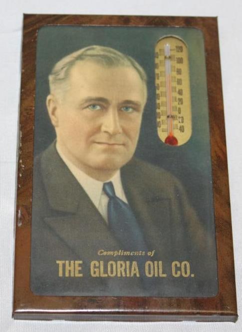 The Gloria Oil Company Advertising Thermometer: in working condition, with glass face, 5.5" x 3.5"