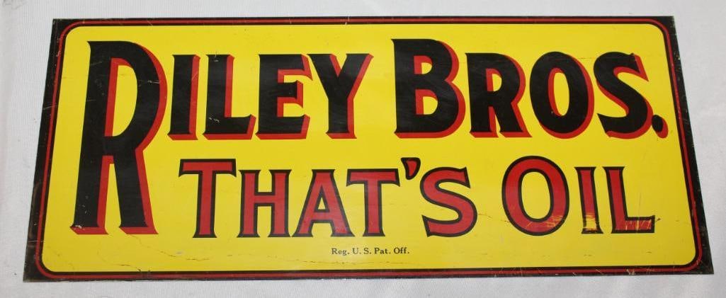 Riley Bros "That's Oil" Tin Advertising Sign: 13" x 5.5" It is in good condition with only light wear and scratches