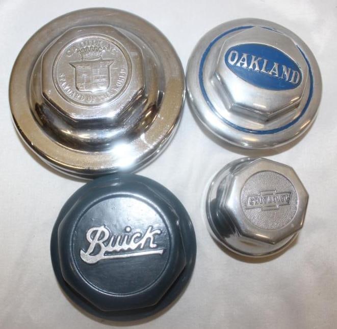 Group of 4 General Motors Cadillac Buick Oakland Chevrolet Threaded Hubcaps: largest 4.5" x 2"