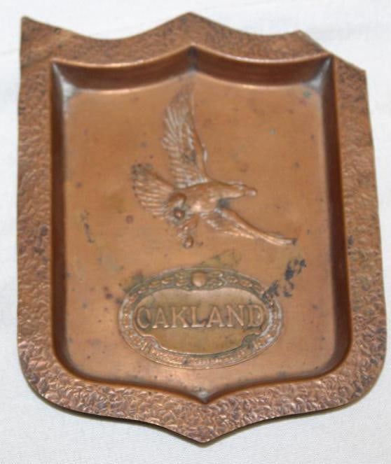 Oakland Pontiac Advertising Ashtray: It is missing a piece of the top right corner. 3.5" x 4.5"