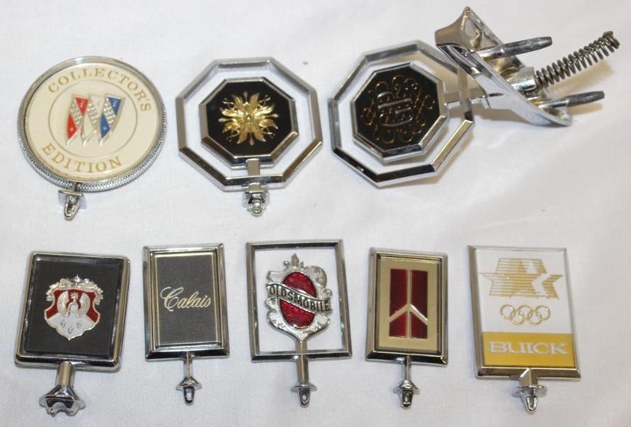 Group of 8 GM Oldsmobile, Pontiac, Buick Hood Ornaments: Largest is 4.5" x 2.5"