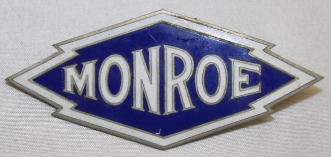 1914-1923 Monroe Radiator Emblem Badge: 1.5" x 3.5" Cloisonne. This is a high quality reproduction emblem.
