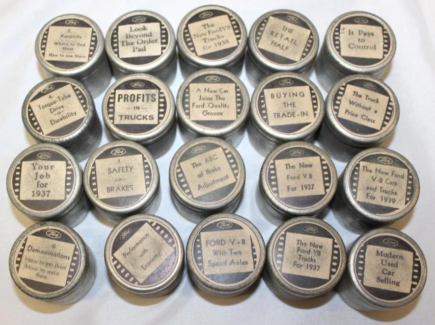 Group of 20 1930's Ford Sales & Service Training Film Container Tins: All are empty; 1.5" x 1.5"