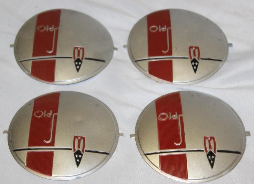 Group of 4 1940 Oldsmobile Eighty-Eight Horn Emblem Badges (1 of 2)