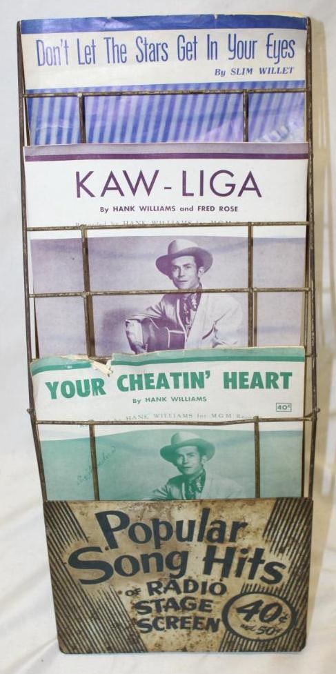 Popular Song Hits Sheet Music Countertop Display 40 cents: It includes 3 music booklets. 8" x 10" x 20.5". It has some rust staining to the sign area.