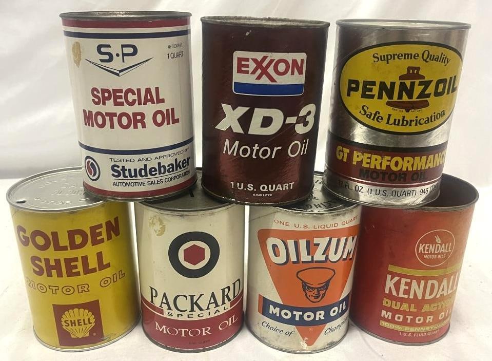 Group of 7 Composite 1 Qt Motor Oil Cans: the Packard and Studebaker are reproductions, 3 are banks