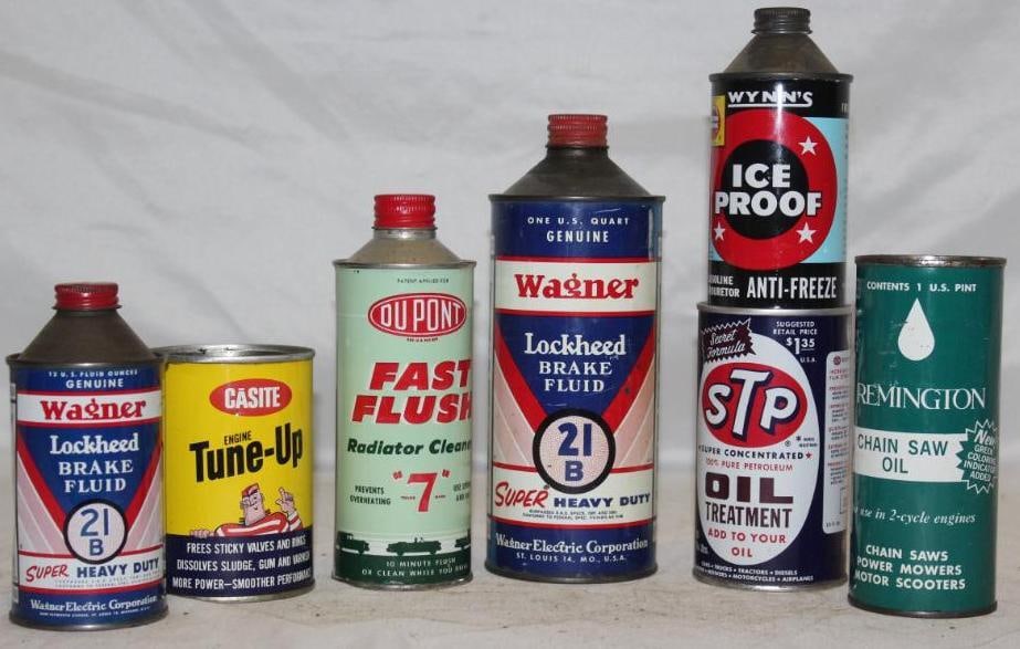 Group of 7 Automotive Oil and Product Cans STP, Remington, Dupont, Wagner: largest 1 quart