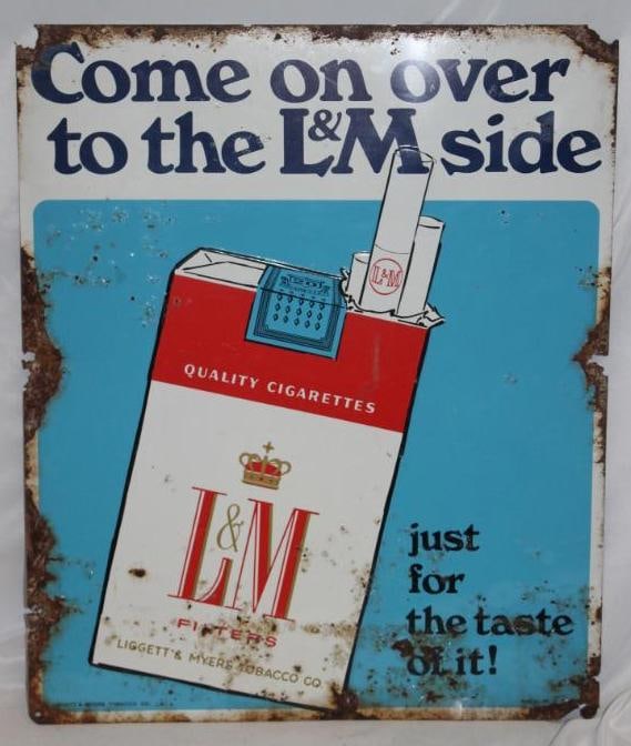 L&M Tobacco Embossed SST Advertising Sign: It has edge rust and rust staining throughout along with some scratches and wear. 20" x 24"