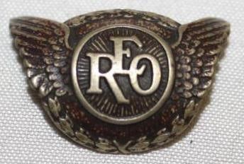 1927-1930 Reo Headlight Emblem Badge: 1" x .75"